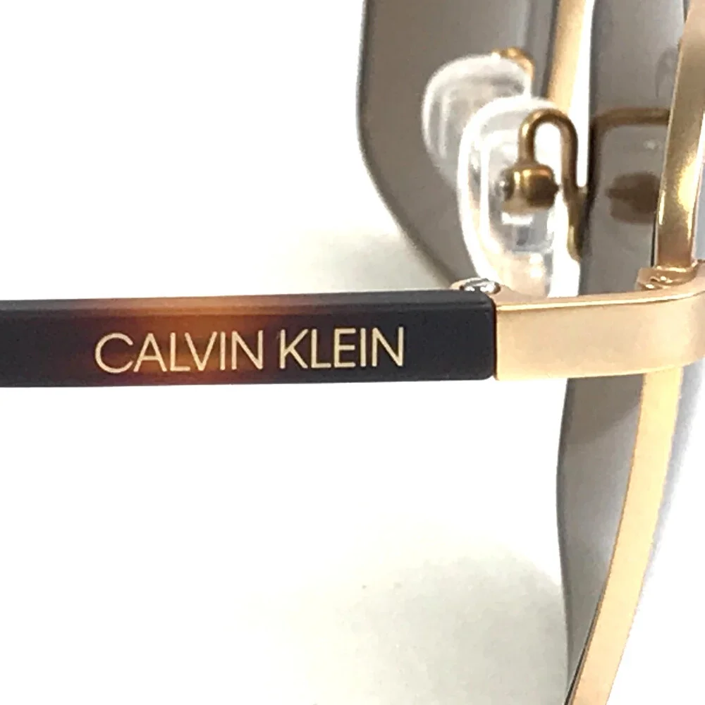 Calvin Klein Sunglasses CK20300S 717 Gold Tortoise Frames with Dark Brown Lenses